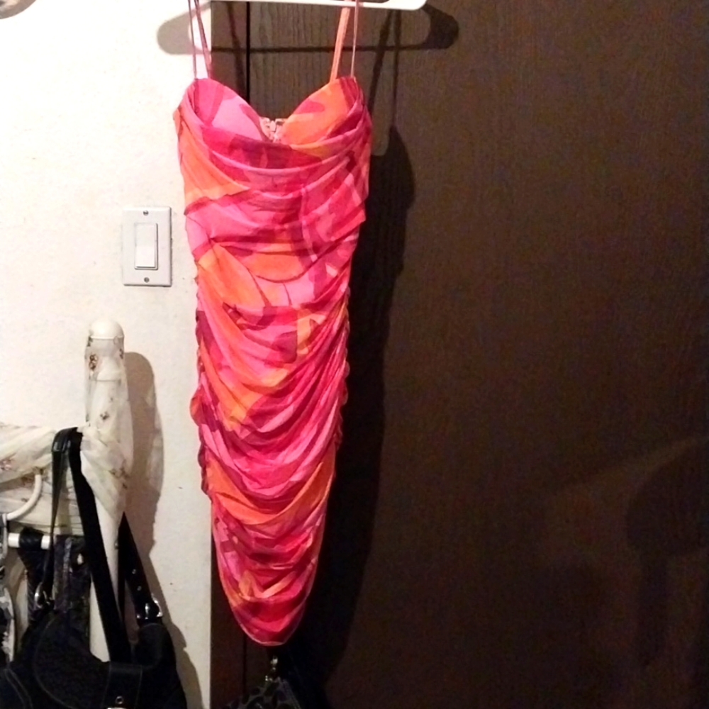 Frank cocktail dress good for any occasion in the evening almost knee length